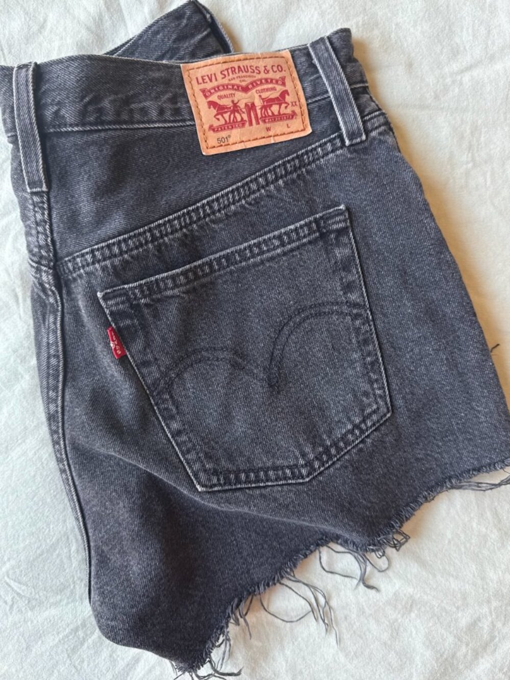 Faded black levi shorts